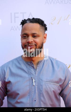 Dublin, Ireland. 20th April 2024.  Kwaku Fortune arriving on the red carpet at the Irish Film and Television Awards (IFTA), Dublin Royal Convention Centre. Credit: Doreen Kennedy/Alamy Live News. Stock Photo