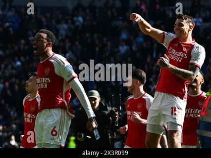 London, UK. 28th Apr, 2024. Gabriel of Arsenal (6) & Jakub Kiwior of Arsenal (15) celebrate after their teams win. Premier League match, Tottenham Hotspur v Arsenal at the Tottenham Hotspur Stadium in London on Sunday 28th April 2024. this image may only be used for Editorial purposes. Editorial use only pic by Sandra Mailer/Andrew Orchard sports photography/Alamy Live news Credit: Andrew Orchard sports photography/Alamy Live News Stock Photo