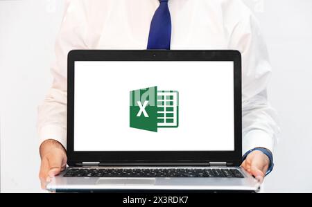 Microsoft Excel usage on Laptop and computer concept for managing data and records, editorial backdrop Stock Photo