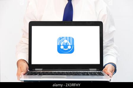 Shareit is a mean of transferring files, editorial concept with application running on laptop screen. Background editorial Stock Photo
