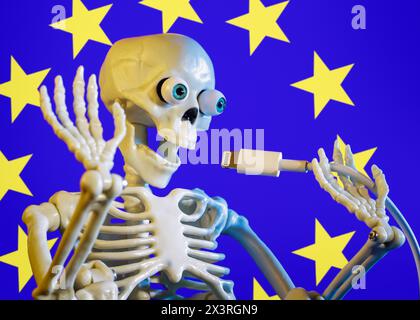 Skeleton toy holding a USB lightning cable He symbolize this connector death. Concept of the picture is depict the long-awaited decision of the EU in Stock Photo