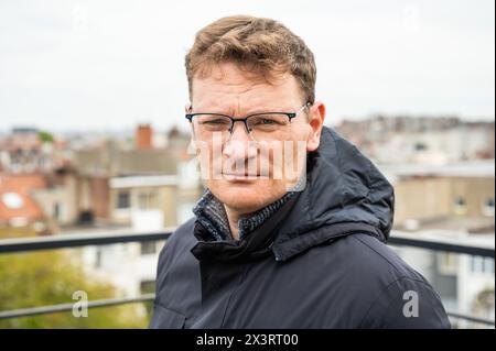 Close up portrait of a 45 yo white man looking serious, Brussels, Belgium. Model released. Stock Photo