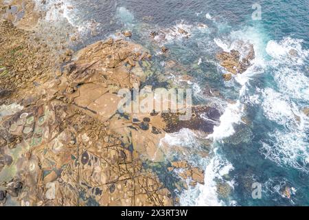 drone view of rocky shore, coastal features concept Stock Photo