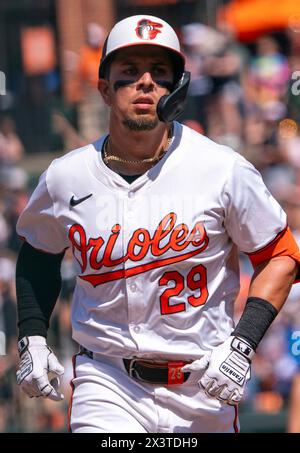 Baltimore Orioles third base Ramón Urías throws to first against the