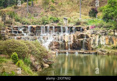 Beautiful waterfall in the park near Da Lat city, Vietnam. Travel photo, nobody, selective focus Stock Photo