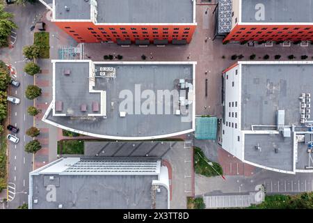 modern industrial and small business office buildings. aerial top view from flying drone. Stock Photo