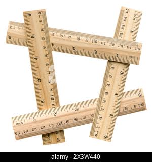 Group of four wooden rulers, arranged as four-sided figure, isolated on white background Stock Photo