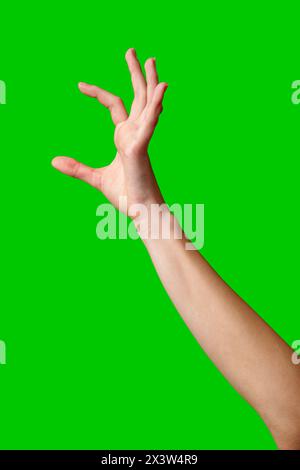A womans hand extends upward into the air, fingers outstretched ...