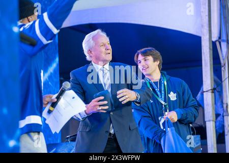 April 24, 2024, Toronto, Ontario, Canada: Former Leaf captain and hockey legend Darryl Sittler on stage at Maple Leaf Square outside Scotibank Arena, before Round 1, Game 4 playoff game of Toronto Maple Leafs vs Boston Bruins playoff game During Toronto Maple Leafs playoff games, Maple Leaf Square transforms into a sea of blue and white, echoing with the chants of passionate fans eagerly rallying behind their team's quest for victory. The electric atmosphere radiates anticipation and excitement, creating unforgettable memories for both die-hard supporters and casual observers alike. (Credit Im Stock Photo