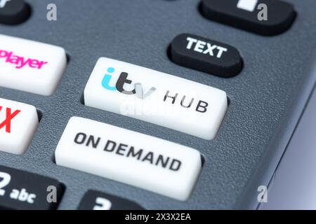 Close-Up Of a Freesat Remote Control which has buttons for the itv Hub and On Demand Stock Photo