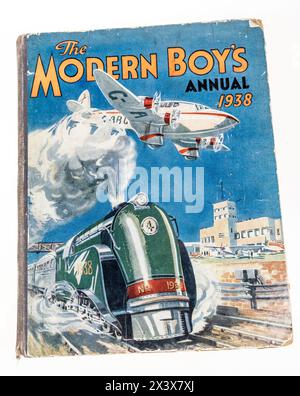 The Modern Boy's Annual, pre-war in 1938, the cover with transport by train and aircraft Stock Photo