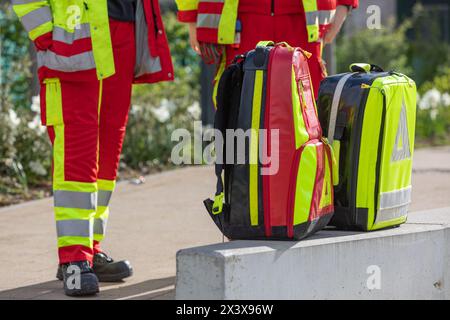 Paramedics next to emergency backpacks wait for a call Stock Photo