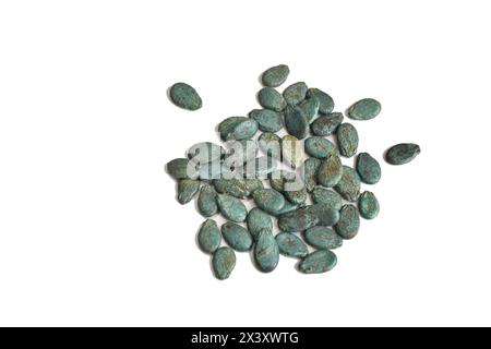 Dry watermelon seeds in a protective shell, ready to eat, on a white background. Stock Photo