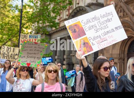 Participants march for those affected by eating disorders in central London. Stock Photo