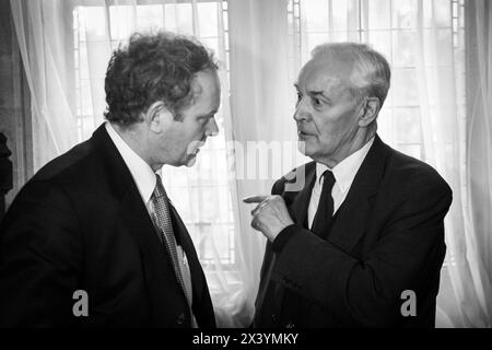 Martin McGuinness, politician who was a member of Sinn Fein, the political wing of the Irish Republican Party talks with Tony Benn MP of the Labour Party at Westminster , UK in the year 2000 Stock Photo