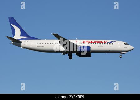 Turkish AnadoluJet Boeing 737-800 with registration TC-JHJ on final for Dusseldorf Airport Stock Photo