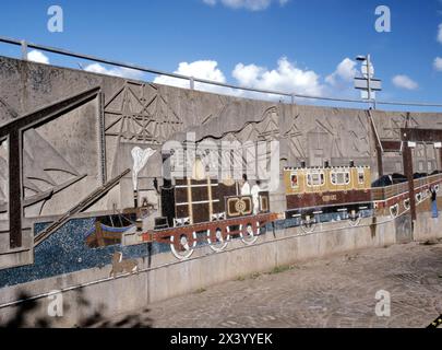 The Old Green Roundabout Mural in Newport Gwent depicting industrial heritage – coal, railways and canals - in South Wales UK. Stock Photo