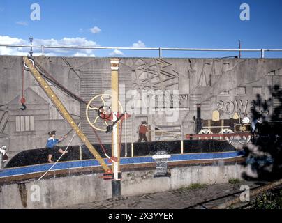 The Old Green Roundabout Mural in Newport Gwent depicting industrial heritage – coal, railways and canals - in South Wales UK. Stock Photo