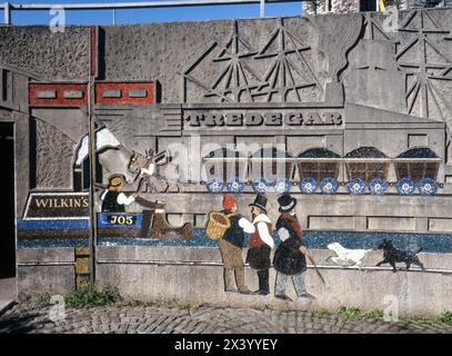 The Old Green Roundabout Mural in Newport Gwent depicting industrial heritage – coal, railways and canals - in South Wales UK. Stock Photo