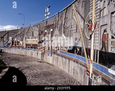 The Old Green Roundabout Mural in Newport Gwent depicting industrial heritage – coal, railways and canals - in South Wales UK. Stock Photo