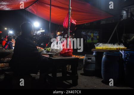 Bandung, West Java, Indonesia. 29th Apr, 2024. Indonesian football fans watch together the 2024 AFC Qatar U23 Asian Cup semifinal football match between Indonesia and Uzbekistan on the streets of Bandung. (Credit Image: © Dimas Rachmatsyah/ZUMA Press Wire) EDITORIAL USAGE ONLY! Not for Commercial USAGE! Stock Photo