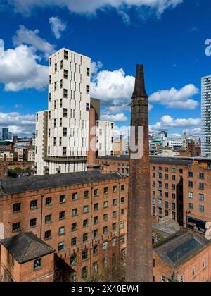 Historical Victorian Mills and Modern Skyscrapers in Manchester, England Stock Photo