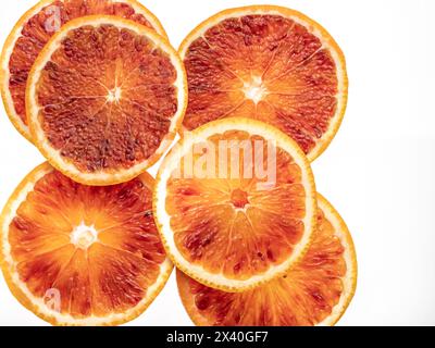 Red blood orange fruit slices isolated on white background Stock Photo