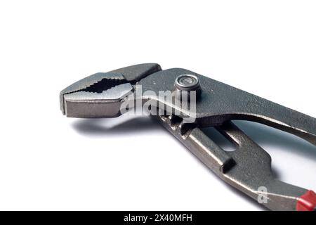 New open nut wrenches, adjustable pliers isolated on white, close-up macro view Stock Photo