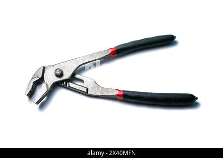 New open nut wrenches, adjustable pliers isolated on white, close-up macro view Stock Photo