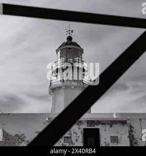 Weathered lighthouse in black and white, Lighthouse of Cabo de Sao Vicente; Cape St. Vincent, Sagres, Portugal Stock Photo