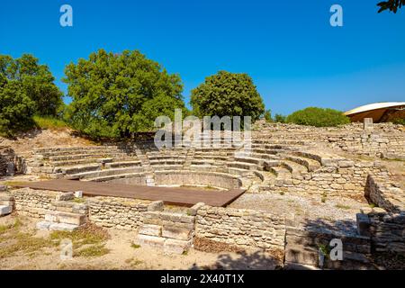 Odeon of Troy ancient city. Ancient city ruins in Turkiye concept background photo. Stock Photo