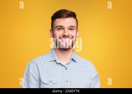 Smiling Bearded Man Looking at Camera Stock Photo