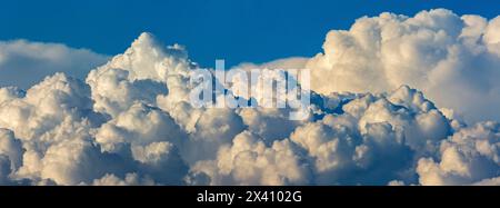 Panorama of dramatic storm clouds with blue sky; Calgary, Alberta, Canada Stock Photo