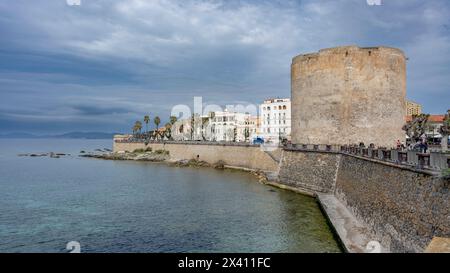 Ancient walls and Mediterranean Sea at the city of Alghero, Italy; Alghero, Sassari, Italy Stock Photo