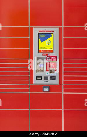 Szeged, Hungary - August 01, 2022: Foxpost Digital Terminal Locker Storage Box for Picking Up Consignments in Tesco Supermarket and Shopping Mall. Stock Photo