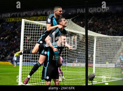 Leicester City's Jamie Vardy celebrates scoring their side's second goal of the game with Harry Winks and Conor Coady during the Sky Bet Championship match at Deepdale, Preston. Picture date: Monday April 29, 2024. Stock Photo