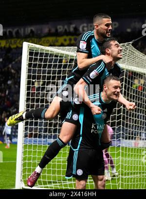 Leicester City's Jamie Vardy celebrates scoring their side's second goal of the game with Harry Winks and Conor Coady during the Sky Bet Championship match at Deepdale, Preston. Picture date: Monday April 29, 2024. Stock Photo