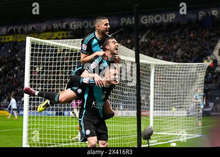 Leicester City's Jamie Vardy celebrates scoring their side's second goal of the game with Harry Winks and Conor Coady during the Sky Bet Championship match at Deepdale, Preston. Picture date: Monday April 29, 2024. Stock Photo