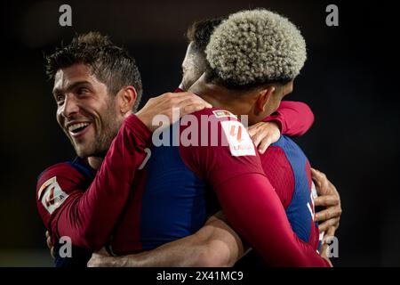 Barcelona, Spain. 29th Apr, 2024. Robert Lewandowski (FC Barcelona) celebrates with Sergi Roberto (FC Barcelona) and Ronald Araujo (FC Barcelona) during a La Liga EA Sports match between FC Barcelona and Valencia CF at Estadi Olímpic Lluis Companys, in Barcelona, Spain on April 29, 2024. Photo by Felipe Mondino/Sipa USA Credit: Sipa USA/Alamy Live News Stock Photo