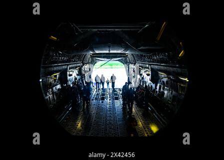 Local pilots attend the 305th Air Mobility Wing's Mid-Air Collision Avoidance fly-in at Joint Base McGuire-Dix-Lakehurst, N.J., April 20, 2024. The MACA program is designed to ensure safety practices are observed between military and civilian pilots who share a common airspace. Stock Photo