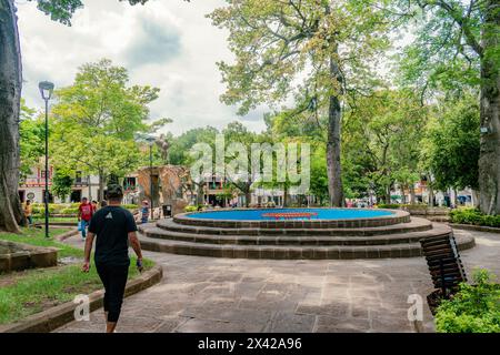 San Gil, Santander, Colombia, April 26, 2024, view of the main park of San Gil with the fountain in the center without water, due to the shortage due Stock Photo