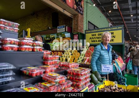 Shoppers at the South Melbourne market. The market is an inner city landmark and favorite of tourists. South Melbourne, Victoria, Australia. Stock Photo