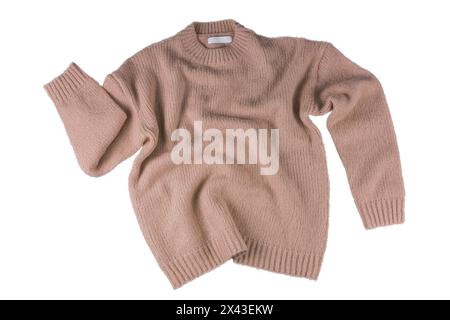 Brown flying crumpled women's autumn knitted sweater isolated on white background. Creative clothing concept, trendy fall winter cozy creasy jersey pu Stock Photo