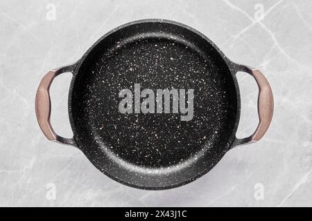 Double handled frying pan with non-stick coating for omelette Stock Photo