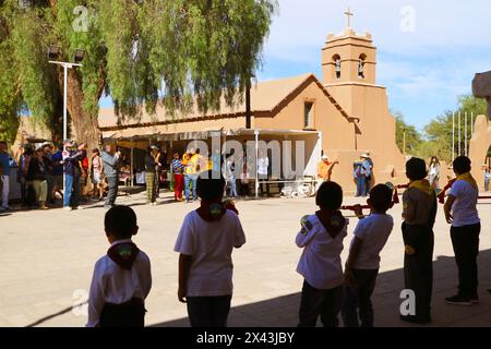 Church of San Pedro de Atacama with Activity of Local Children on Sunday of April, El Loa Province of Northern Chile, South America Stock Photo