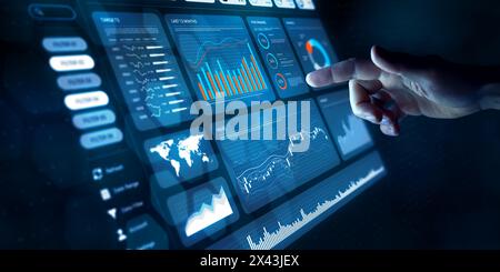 Analyst working with Financial Data and Business Analytics Dashboard on computer to make Financial Report with KPI and Metrics. Investment, Corporate Stock Photo