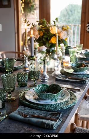 Table set for Christmas dinner in East Sussex home, South East England, UK Stock Photo