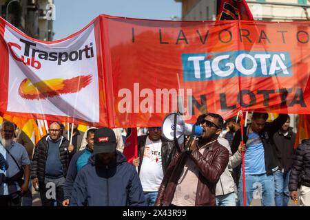 Milano, Italia. 30th Apr, 2024. Corteo dei lavoratori del sindacato Cub di Tigotà contro licenziamenti e chiusura del magazzino di Broni da Via Taramelli alla sede della Regione Lombardia - Cronaca - Milano, Italia - Martedì, 30 Aprile 2024 (foto Stefano Porta/LaPresse) Procession of Tigotà workers against layoffs and closure of the Broni warehouse from Via Taramelli to the headquarters of the Lombardy Region - News - Milano, Italy - Tuesday, April 30, 2024 (photo Stefano Porta/LaPresse) Credit: LaPresse/Alamy Live News Stock Photo