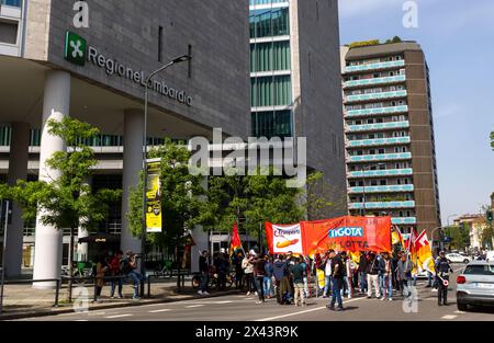 Milano, Italia. 30th Apr, 2024. Corteo dei lavoratori del sindacato Cub di Tigotà contro licenziamenti e chiusura del magazzino di Broni da Via Taramelli alla sede della Regione Lombardia - Cronaca - Milano, Italia - Martedì, 30 Aprile 2024 (foto Stefano Porta/LaPresse) Procession of Tigotà workers against layoffs and closure of the Broni warehouse from Via Taramelli to the headquarters of the Lombardy Region - News - Milano, Italy - Tuesday, April 30, 2024 (photo Stefano Porta/LaPresse) Credit: LaPresse/Alamy Live News Stock Photo