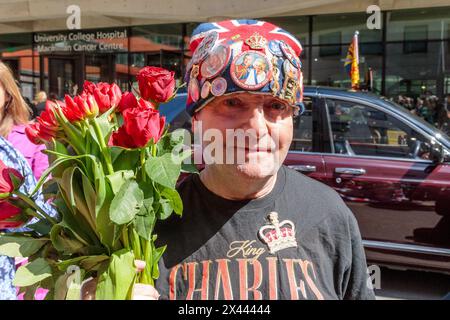 University College Hospital, London, UK. 30th April 2024. Royal Superfan, John Loughrey, waits for His Majesty, King Charles III, Patron of Cancer Research UK and Macmillan Cancer Support, and Queen Camilla as they visit University College Hospital Macmillan Cancer Centre, marking The King's first day as the new Patron of Cancer Research UK and his first public engagement since announcing his Cancer diagnosis.  Photo by Amanda Rose/Alamy Live News Stock Photo